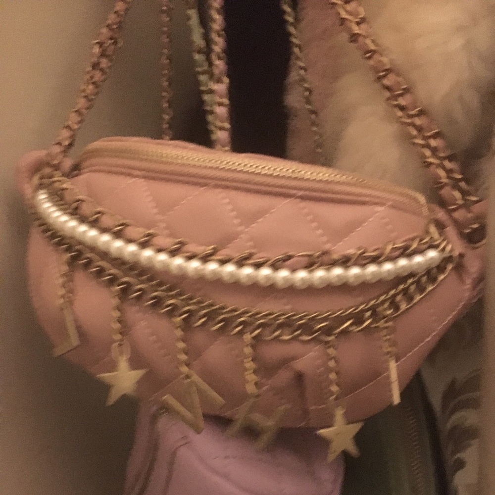 Pink cross body belt bag